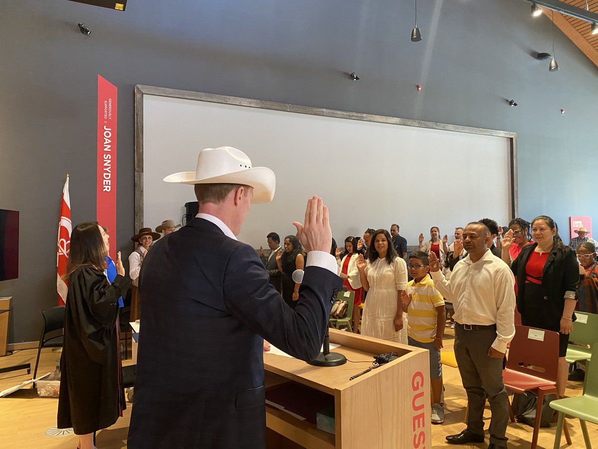 MarcMillerVM's tweet photo. Today, I welcomed 25 new citizens from 6 different countries to our Canadian family, at the Calgary Stampede! Great ending to the week by celebrating those who chose our country as their home. As a bonus, all new citizens got a white hat! https://t.co/5vRwkYFak6