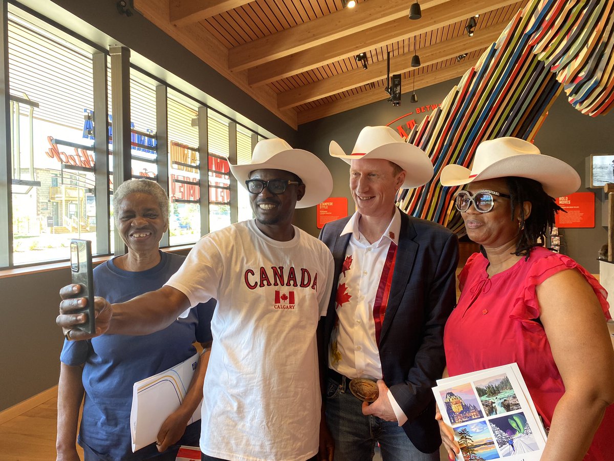 MarcMillerVM's tweet photo. Today, I welcomed 25 new citizens from 6 different countries to our Canadian family, at the Calgary Stampede! Great ending to the week by celebrating those who chose our country as their home. As a bonus, all new citizens got a white hat! https://t.co/5vRwkYFak6