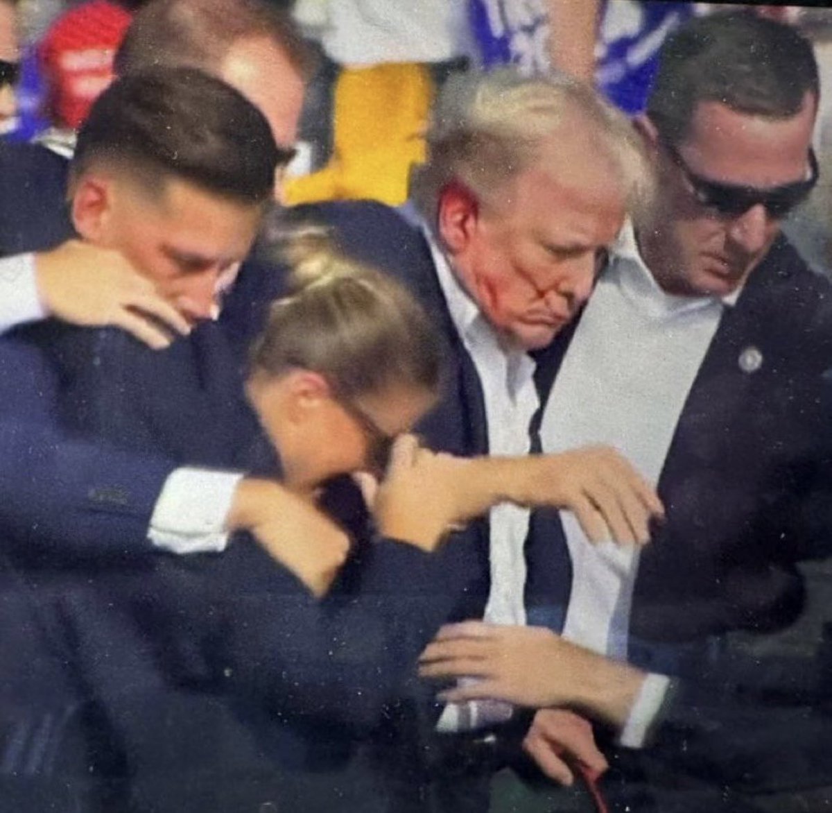 749Abdullah's tweet photo. BREAKING: 🇺🇸 Assassination attempt on Donald Trump at Rally. 

Trump seen bleeding.

#Trump #USA #breaking https://t.co/Cz3V0FKogQ