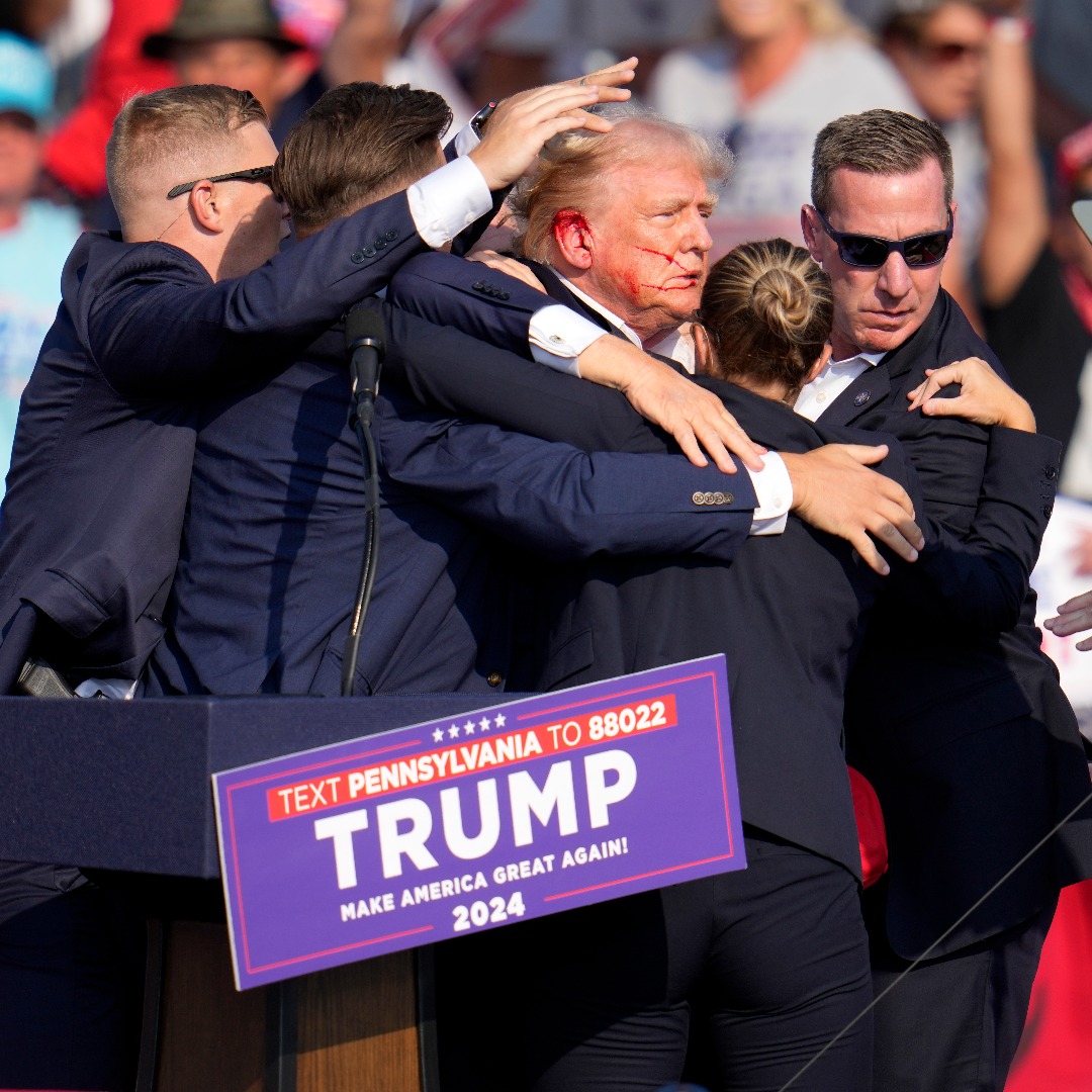 10TV's tweet photo. Donald Trump’s campaign said that he was “fine” after being whisked off the stage at a rally in Butler, Pennsylvania after apparent gunshots rang through the crowd. The campaign says he is “being checked out at a local medical facility.”  | https://t.co/I78Dpwpd6n https://t.co/MPD4AaWip8