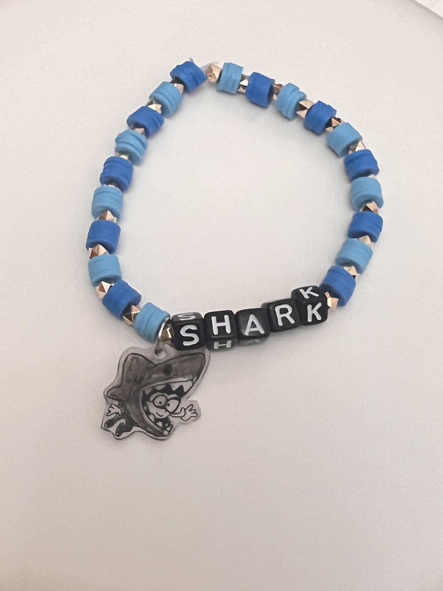 2tammi's tweet photo. @PatrickBallest @SD_Comic_Con one of the bracelets I made for sdcc. I know lots of us will be sharks in line for some of the cutest artwork at con. https://t.co/MCp8cexXzZ