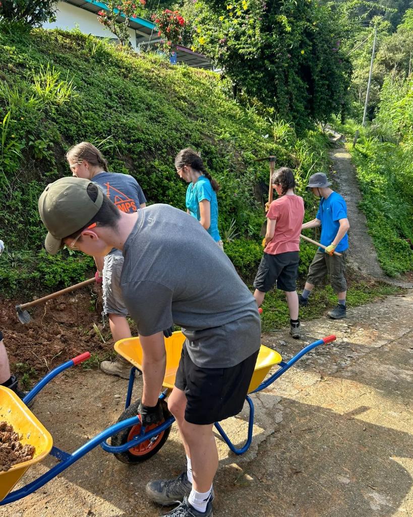 RutherfordTrips's tweet photo. After #team lunbawang spent the evening sharing cultural dances, we were able to do some washing and then a day of project work. This entailed helping build drainage for the road and a toilet block for the community. https://t.co/lerEad5PZH