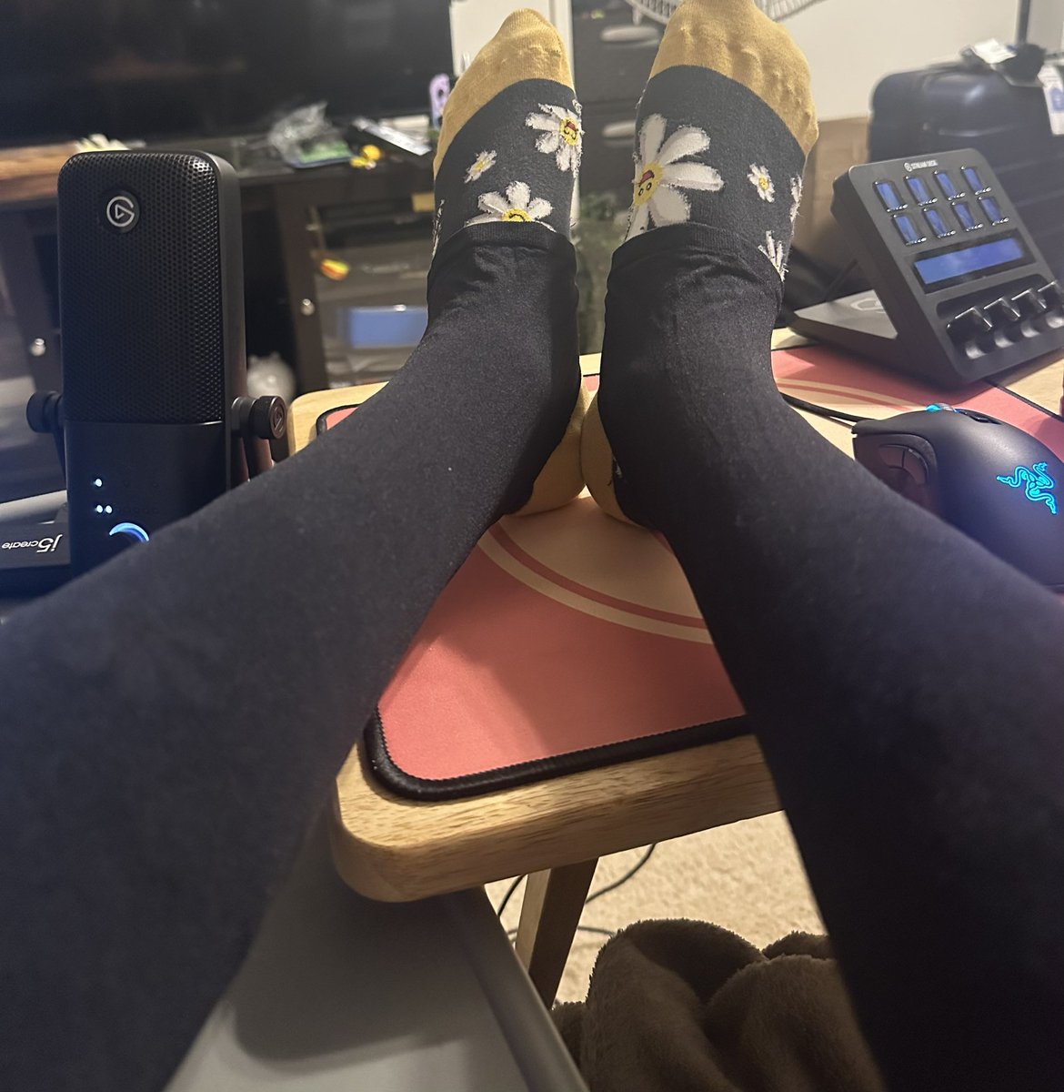 Putting my feet up on my table cause I don’t have a footstool. Bet you wish you were my footstool, huh?