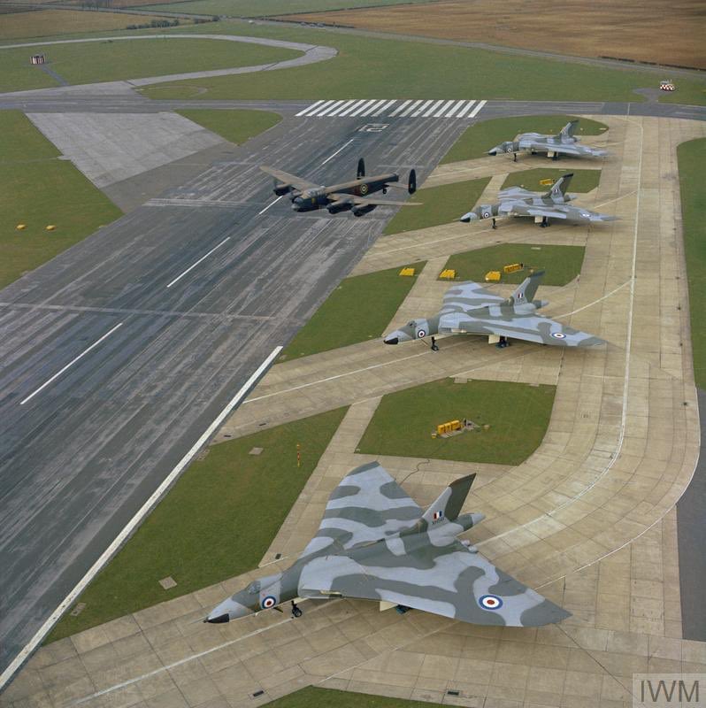 Classic image of Lancaster overflying Vulcan QRA dispersal. Ahh Avro!
