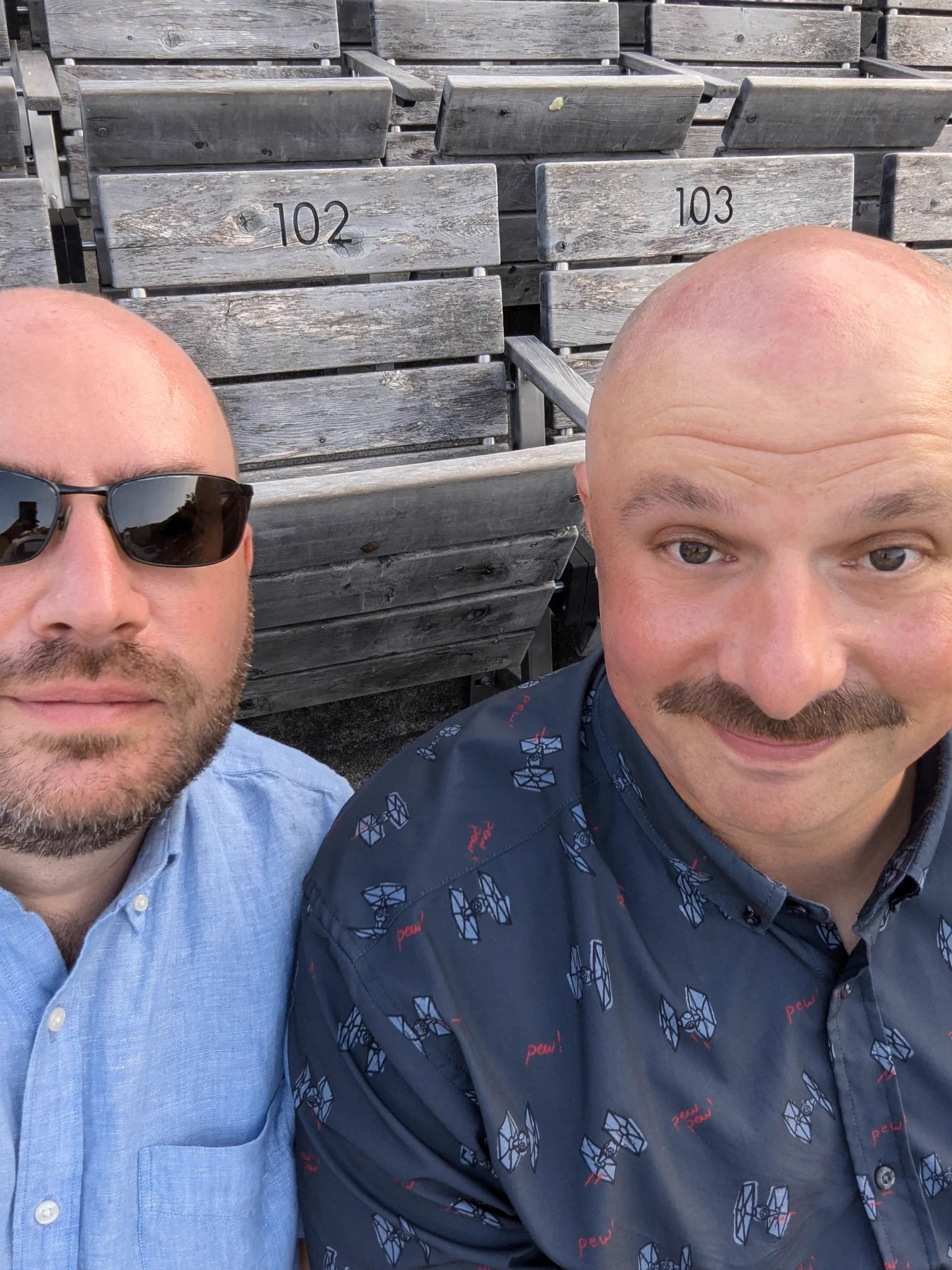Husbands seated for a show at the Hollywood Bowl 