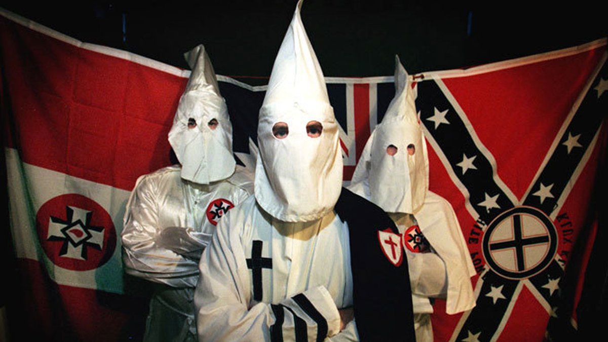 Neiles477's tweet photo. @EducatedOranje "Please just try to understand that the Klan matches are purely an expression of our culture and heritage and NOT to intimidate black folk. We welcome all spectators to watch our marches and the spectacle of the day." https://t.co/a92hOAHZvB