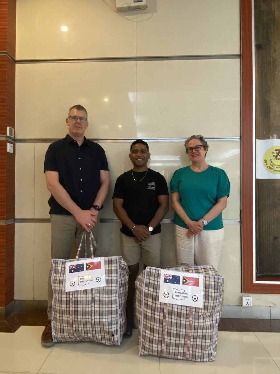 AusAmbDili's tweet photo. Thanks to colleagues from @IndustryGovAu for the fantastic fundraising and donations to #Timor-Leste. The football boots handed over to #EducatingTheFuture in Dili this afternoon will go a long way! https://t.co/NuTXJd5KK5