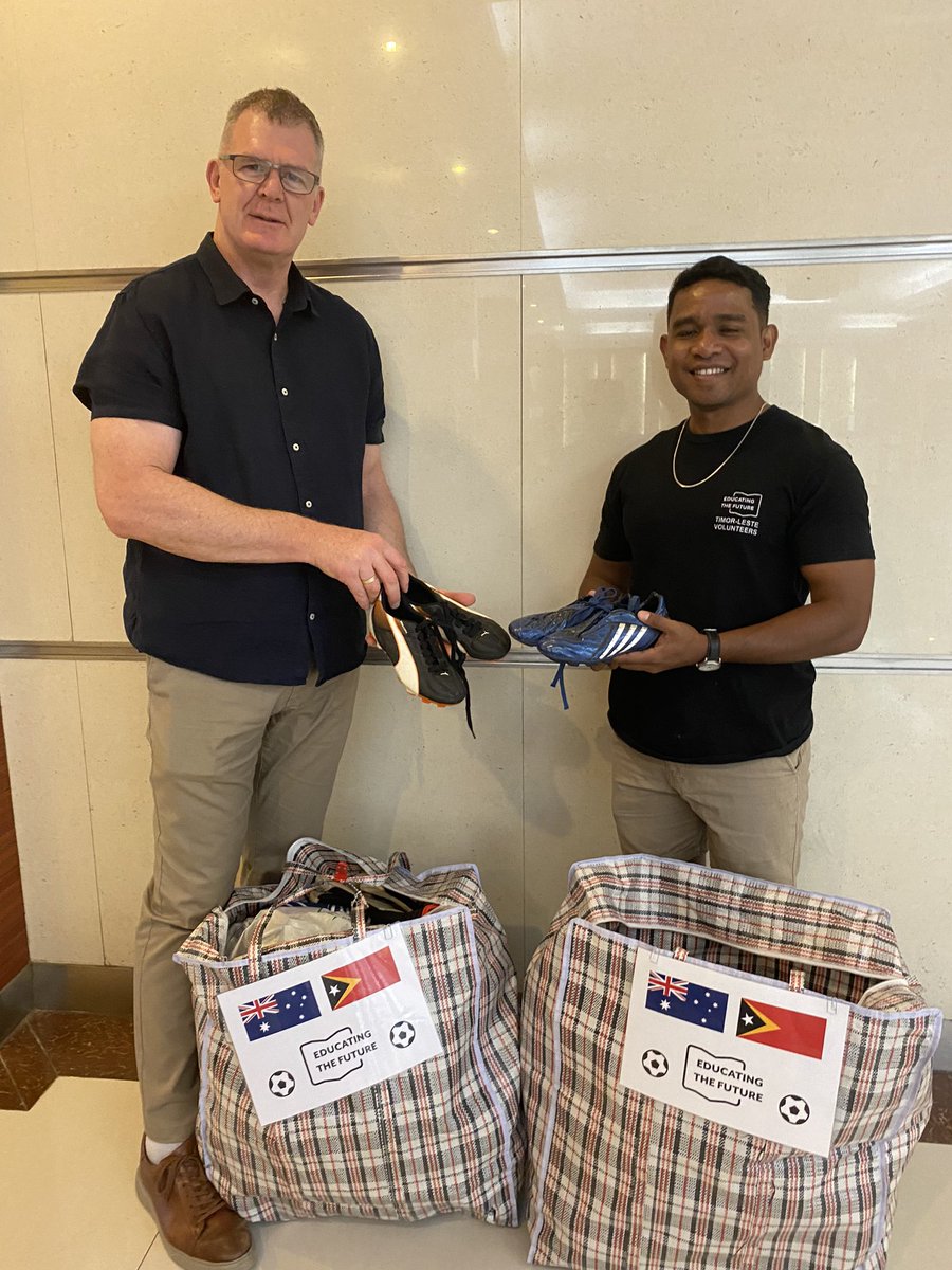AusAmbDili's tweet photo. Thanks to colleagues from @IndustryGovAu for the fantastic fundraising and donations to #Timor-Leste. The football boots handed over to #EducatingTheFuture in Dili this afternoon will go a long way! https://t.co/NuTXJd5KK5
