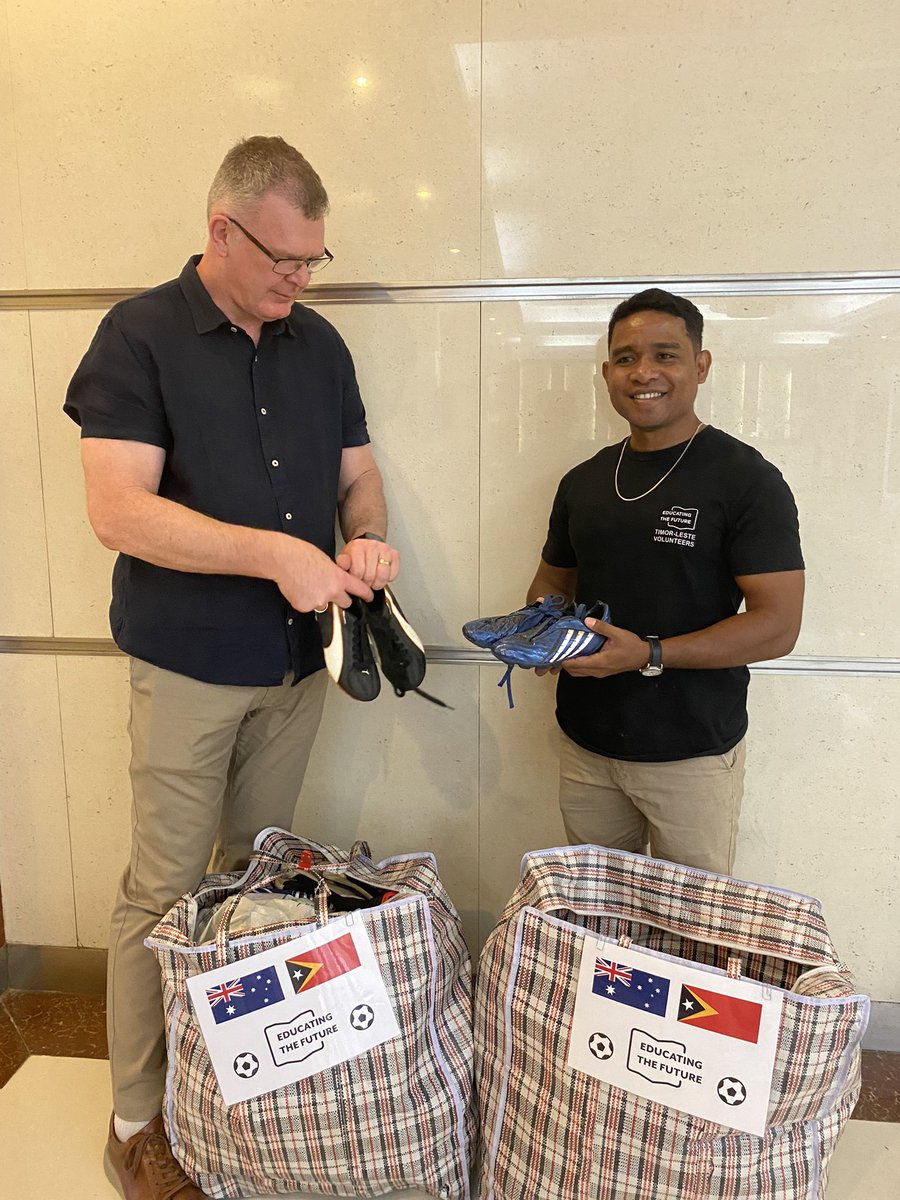 AusAmbDili's tweet photo. Thanks to colleagues from @IndustryGovAu for the fantastic fundraising and donations to #Timor-Leste. The football boots handed over to #EducatingTheFuture in Dili this afternoon will go a long way! https://t.co/NuTXJd5KK5