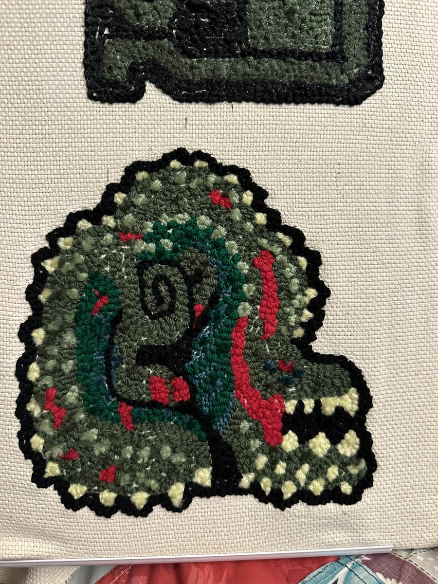 Lithium_Kigen's tweet photo. Punching the yarn done, now to trim the fluffy side, add the glue and sew the edges! #deviljhi #monsterhunter #monhun #punchneedling https://t.co/GqvGzTn0Kd