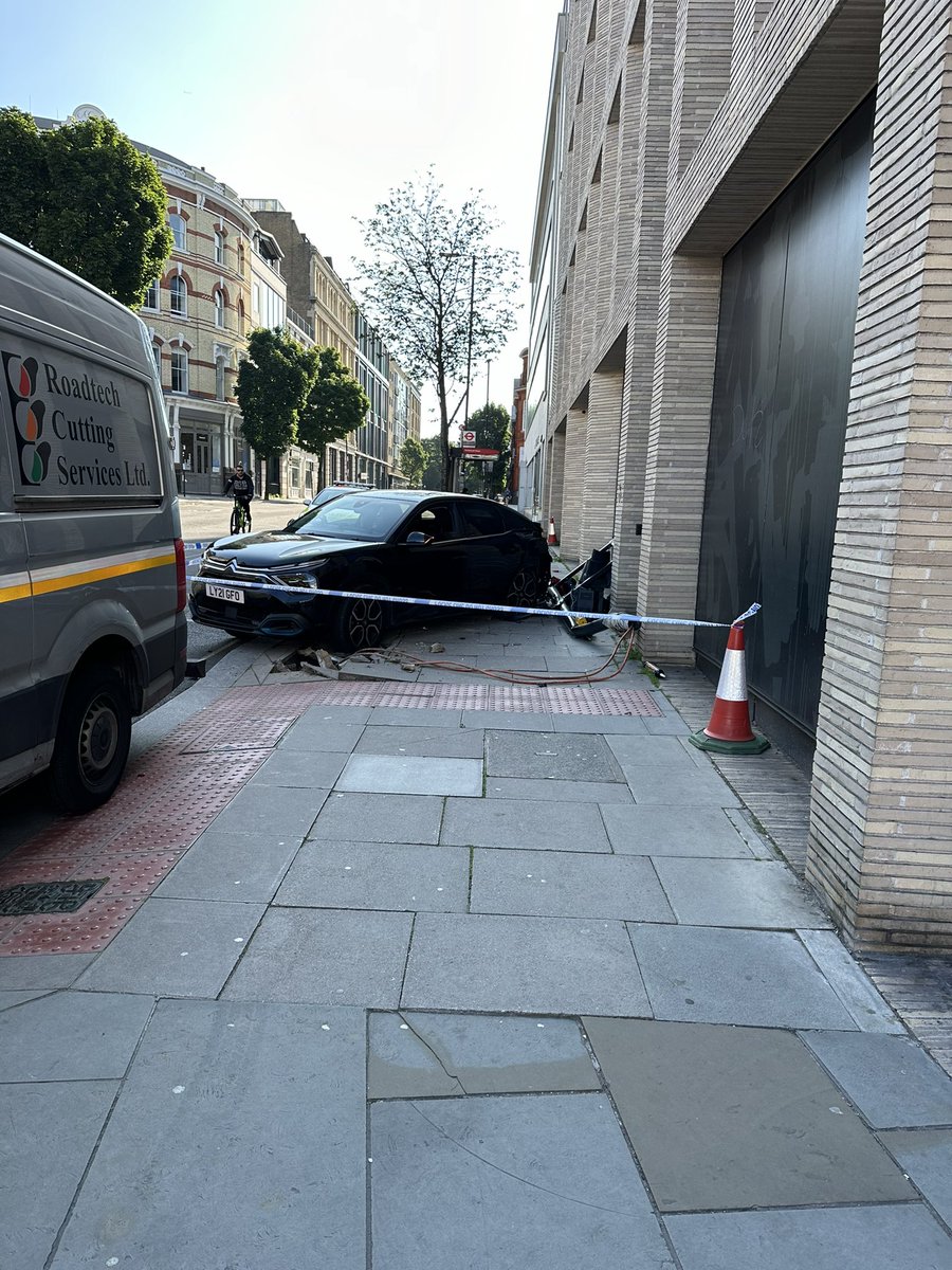 Clerkenwell Road at 8 this morning. Demolished traffic lights and a wrecked car strewn across the pavement. How does this happen in a 20mph zone?