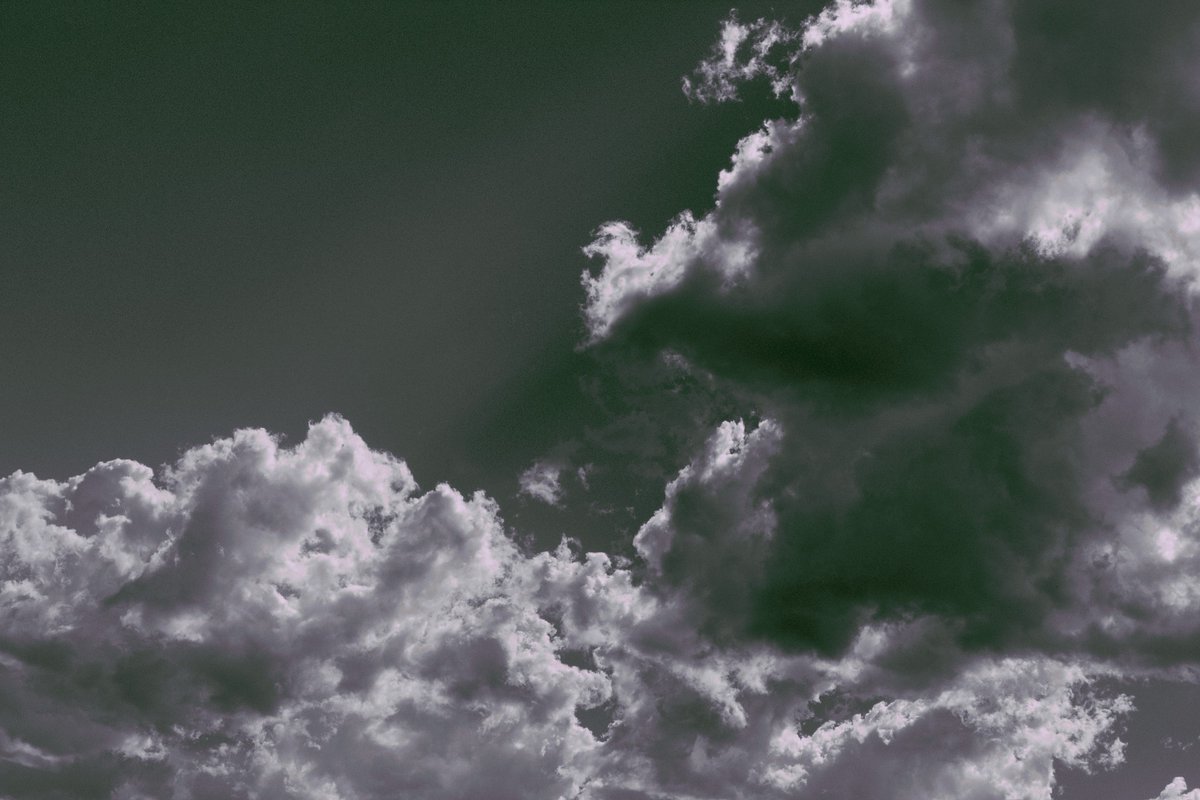 docdevore's tweet image. Clear sunny day brings afternoon storm clouds.