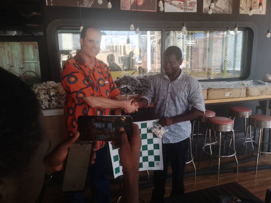 Charles Sawadogo <a href="/SawadogoCharles/">Sawadogo W Charles</a> giving 500 chess sets The Gift of Chess to the Burkina Faso Chess Federation.