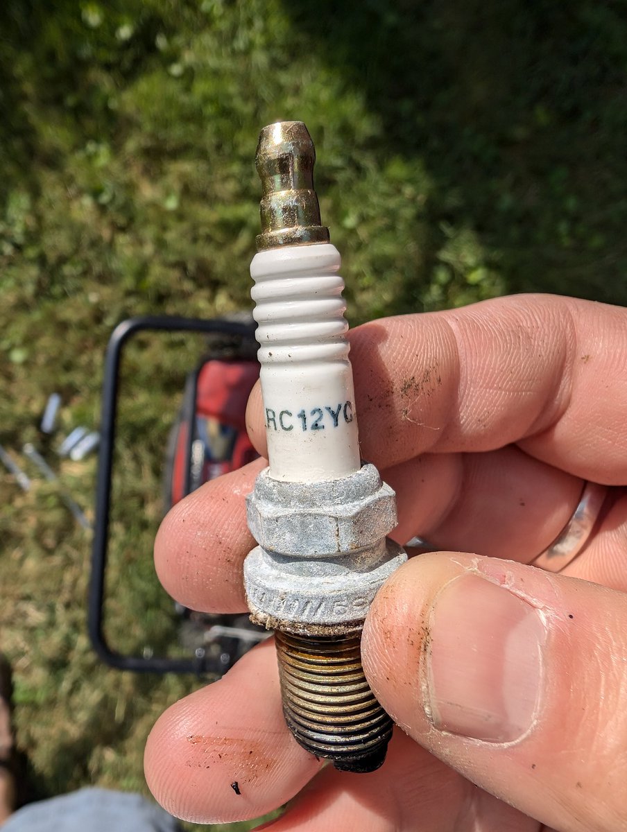wanderingburley's tweet photo. Note to self: If one purchased a lawnmower 2 weeks before the pandemic shutdown, one probably should have changed plug and filter before now.

In other news my lawnmower runs great now 😅 #lawncare #diy https://t.co/M39EPSfEy5