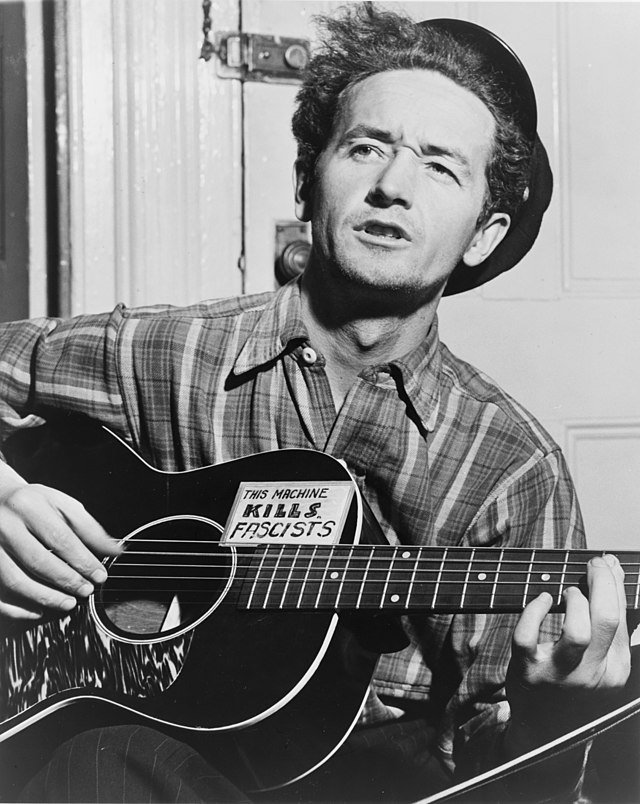 QueenCityJamz's tweet photo. Happy Birthday Woody Guthrie. We sure need more of yer spirit rn. #ThisMachineKillsFascists https://t.co/MVqxvd6jLo