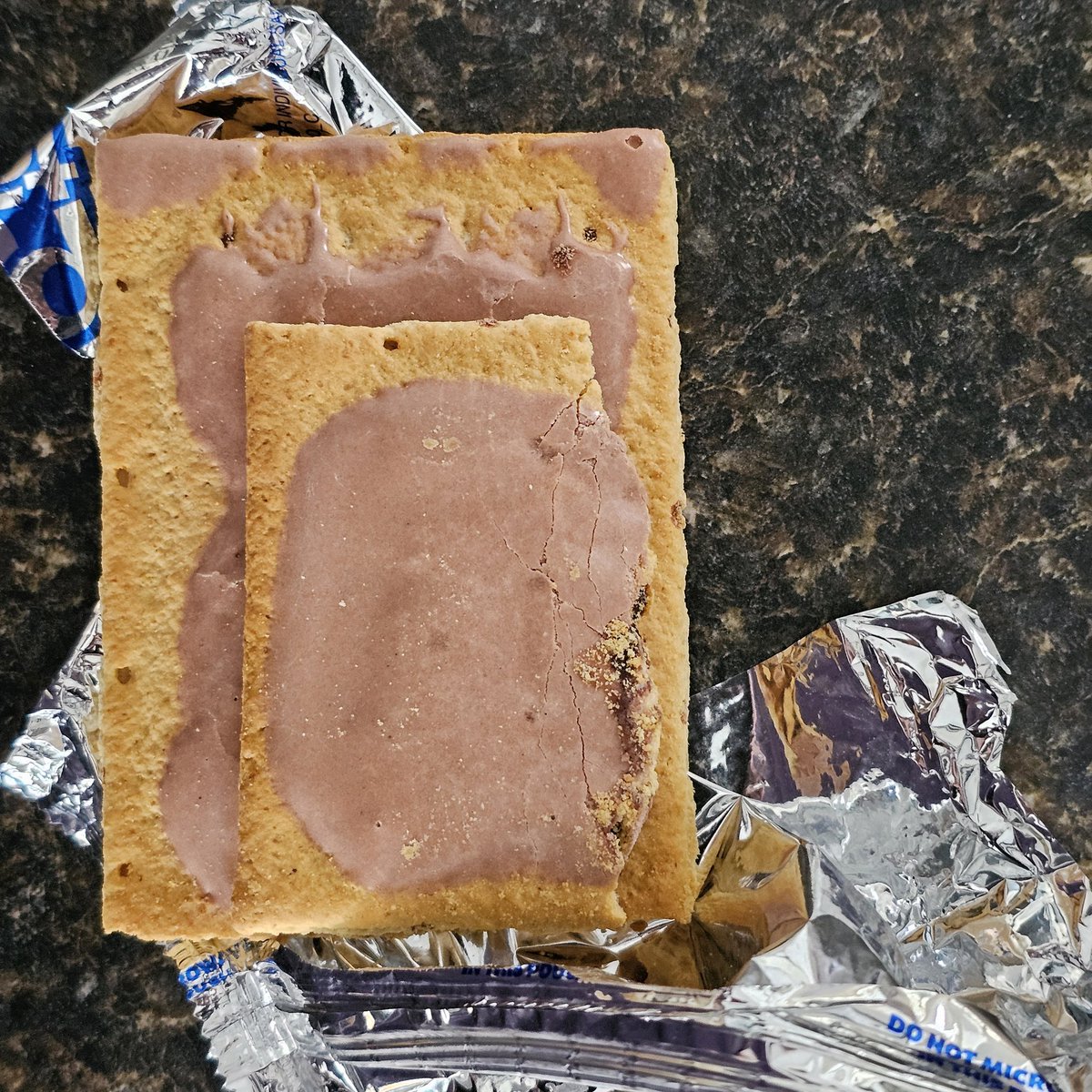 toddwieder's tweet photo. Thanks @PopTartsUS for the weird half-poptart in the sealed packet? Where do I write to to get the other half?? https://t.co/5FKbW24jKU
