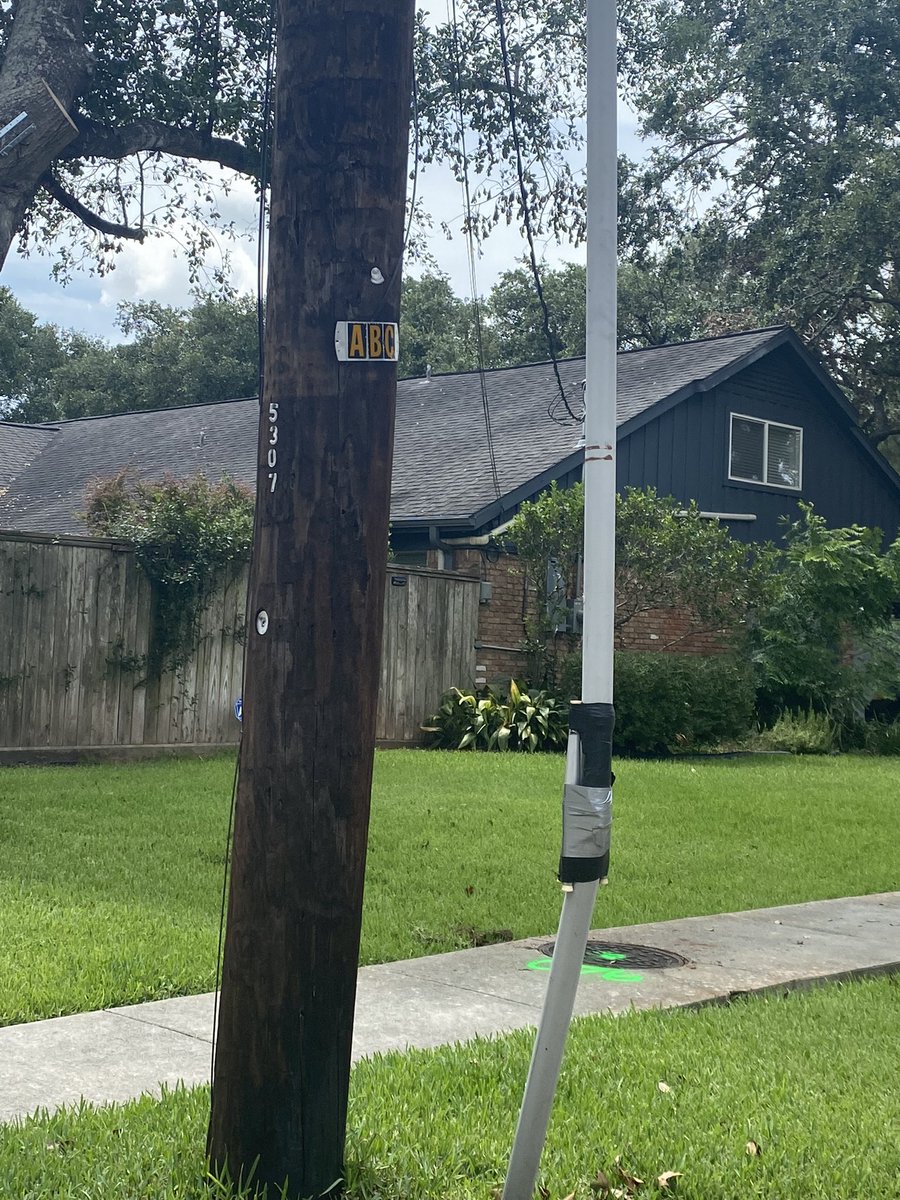 mhirschfield's tweet photo. @CenterPoint your website says our neighborhood in Meyerland is electrified. But there’s a pocket of 20 houses that get power from the same lines connected to the pole in the photo that don’t. You can see the exposed wires tucked into the pole. Please send a crew to come repair. https://t.co/4YY6Py5V0y