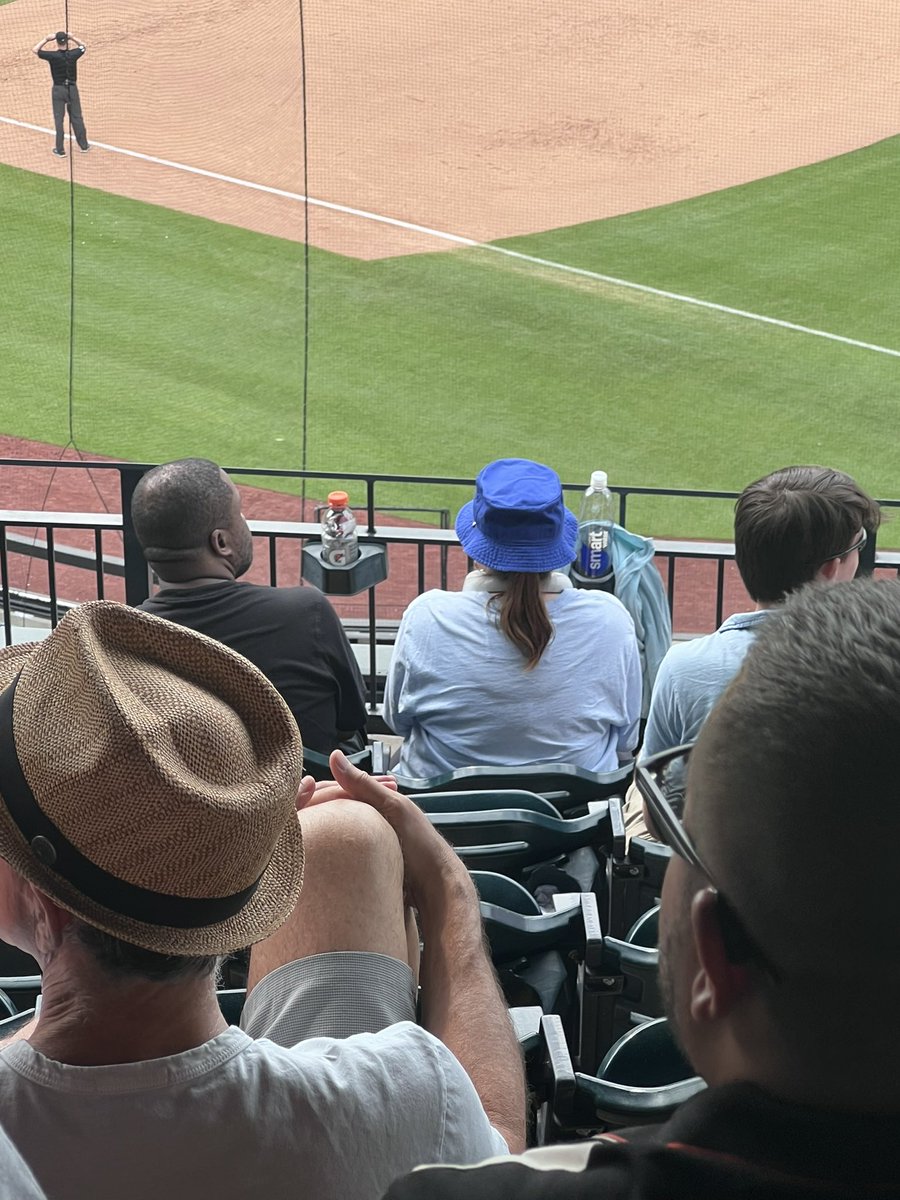 BrickH0ust's tweet photo. Lady in the bucket hat. You don’t try and start the wave with the bases loaded in the bottom of the 8th. #Mets #LFGM #MLB https://t.co/MxfpDfZX7S