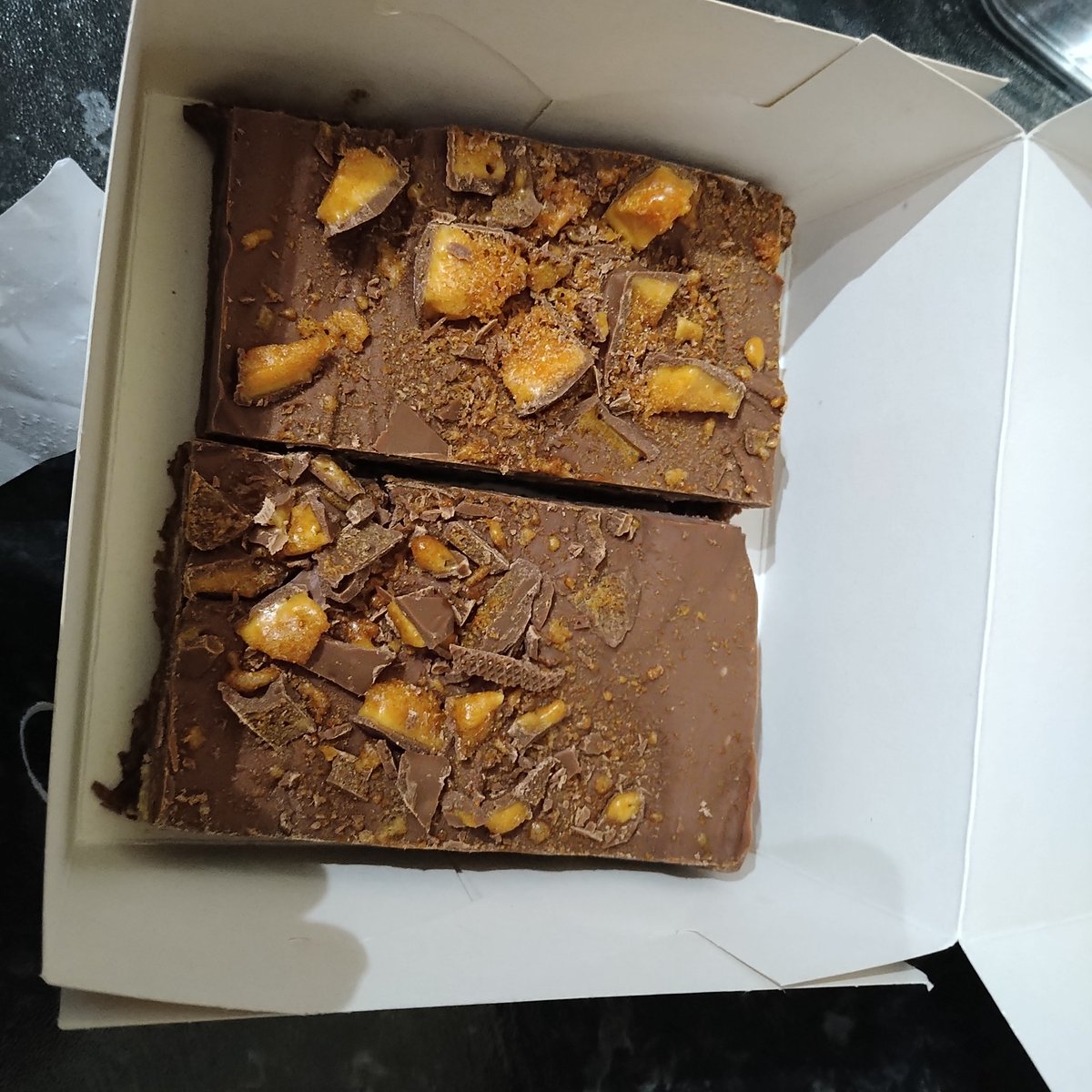cheshirejock's tweet photo. The best ever chocolate crunchy tiffin from #shed24@Hellifield.... delivered by steam train!! https://t.co/NRwh1ezJZE