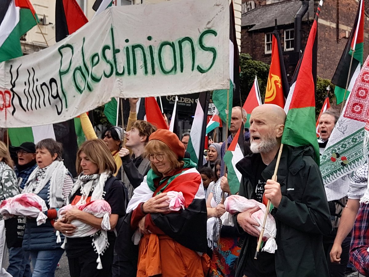jeremykopite's tweet photo. Liverpool Sunday march for justice for Palestine and immediate ceadefire, negotiating the usual crowded streets and even the bookstall outside @newsfromnowhere. @PSCupdates @GMF_Palestine @bbcmerseyside @LivEchonews @BlackOutP_ @QudsNen @BDSmovement @MiddleEastMnt @bricup @PACBI https://t.co/6RfuKiSIXu