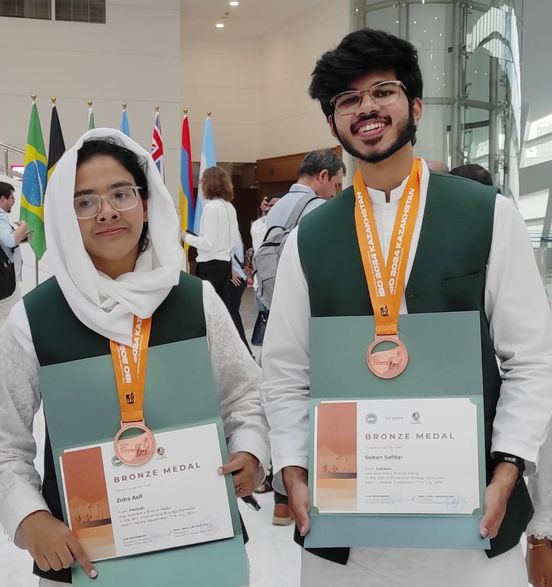 STEM_HEC's tweet photo. A huge round of applause for Ms. Zoha Asif and Mr. Soban Safdar for winning bronze medals at the IBO in Astana! 🇵🇰 #FutureBiologists #PakistanShines https://t.co/CtnacS0zLD