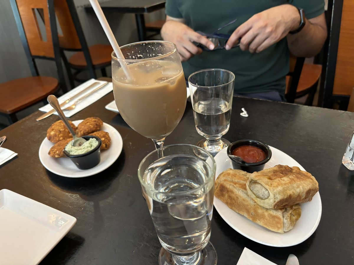 CherKhann's tweet photo. Sri Lanka 🇱🇰 - Sigiri. With dal vada, gothamba roti, kotthu paratha, coconut cashew curry, and watallapam to accompany, the sleeper hit was the iced coffee, accented with cloves, cardamom and cinnamon. https://t.co/t53LcJSiBJ