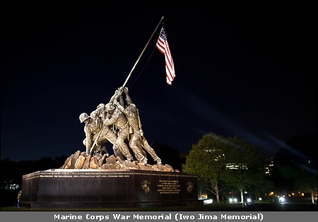 If you like it or not, this is the World Press Photo of the year!  See the similarity with the Marine Corps War Memorial (Iwo Jima Memorial). I wonder who the photographer is. What a shot.