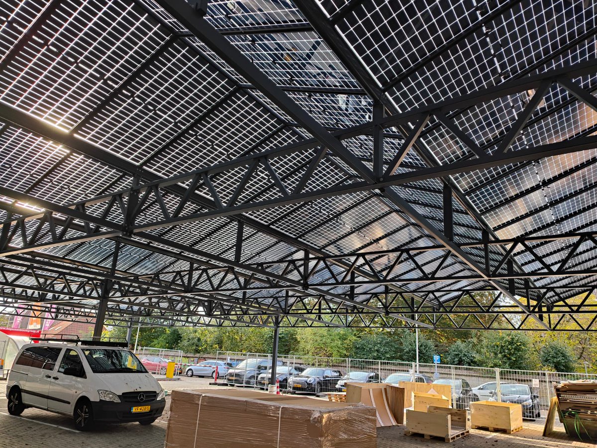 Our commercial solar carports has: 

Semi-transparent panels to let natural sunlight through
Watertight seals 
Integral gutters as part of the frame
Maximum 16m long spans between uprights
3.5m height for 
In-house design software

Email Adam@solfit.co.uk For a FREE design