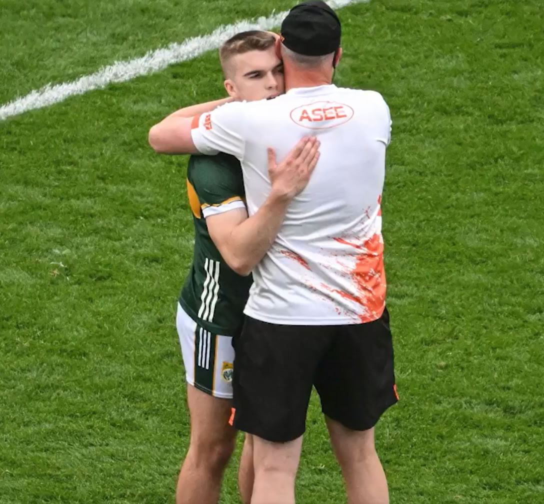 PST_Sport's tweet photo. A photo that says it all! Heartbreak for one, triumph for the other. Work colleagues at #PSTSport, club teammates at @AustinStacksGAA, great friends, and rivals last Saturday @Kerry_Official vs @Armagh_GAA. @dylancasey88 &amp; @starryboy14, we are so very proud of you both. https://t.co/EXJvTC009d