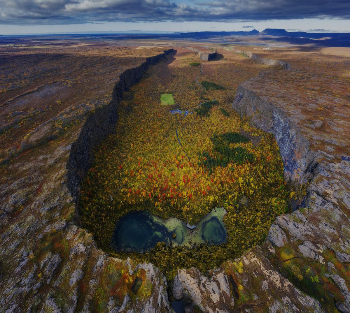 **Ásbyrgi Canyon** is a prime destination for magical tourism in Iceland. Steeped in folklore, it’s said to be the hoofprint of Odin's mythical horse, Sleipnir, offering an enchanting experience for visitors.#tourism #iceland #magicaltourism #beautifulworld #magic #folklore