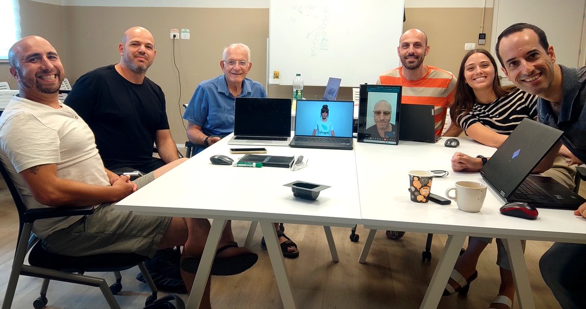 nisyron's tweet photo. This casual picture marks a history at @InprisHumAIns and maybe globally, as we sent the first conversational autonomous AI agent into the wild to contact a large enterprise's customer base with a proactive goal and no human in the loop. Congratulations on a new era! 🎊 https://t.co/UR2izHu50J