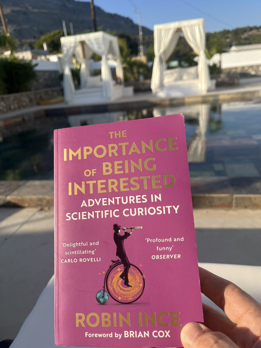 mgpazza's tweet photo. Relaxing on holiday with this brilliant and thought provoking book by #robinince when Space Oddity comes up on shuffle on the playlist I’m listening to…. Who says there’s no divine intervention 😂 https://t.co/s8zPyHyjB4