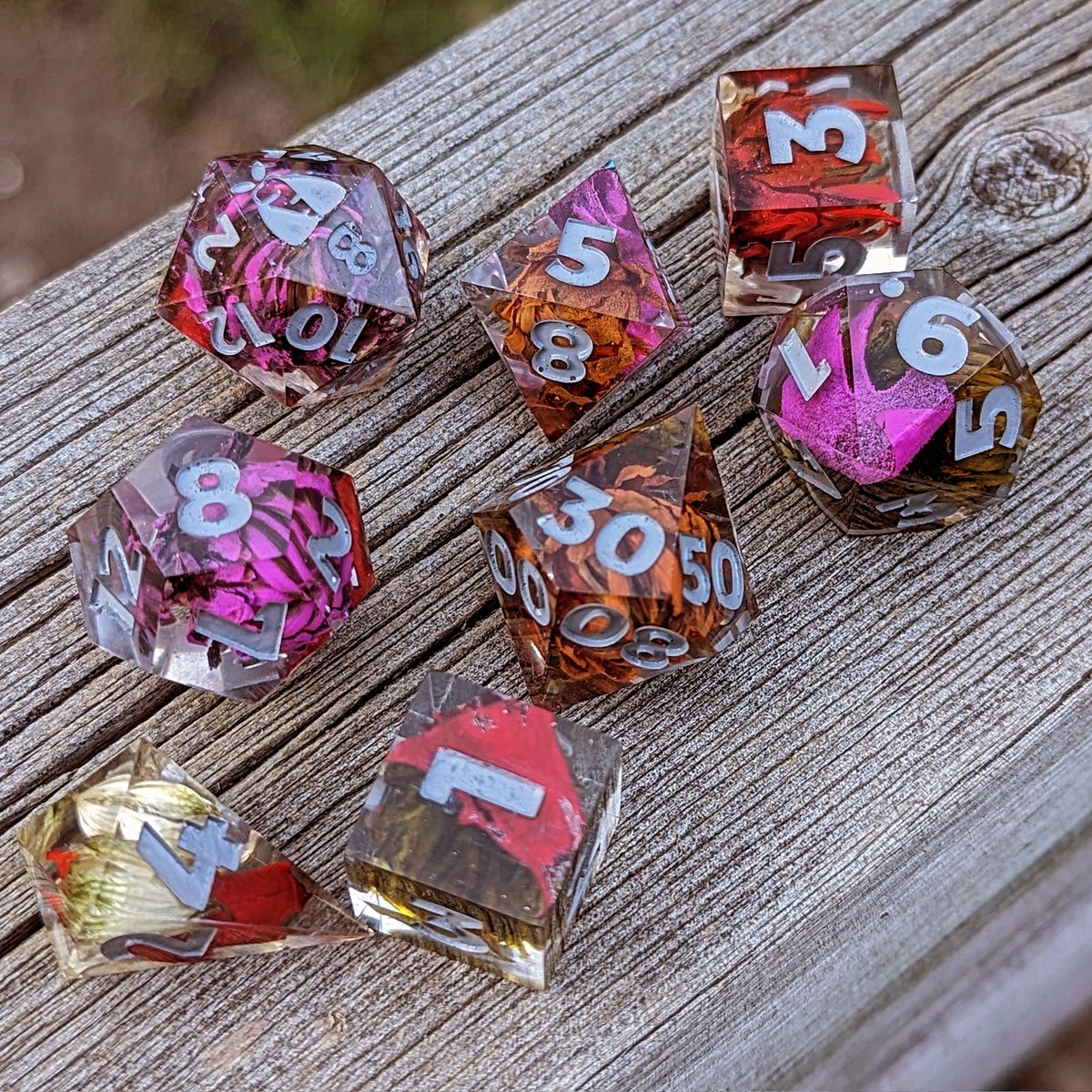 KarMothDice's tweet photo. July showers? Check out our flowers 👀

#HandmadeDice #ShopSmall #MadeInCanada #resin #resindice #resinart #dice #diceart #diceporn #ttrpg #ttrpgart #dungeonsanddragons #dnd #dndart https://t.co/3uVUJT7DjC