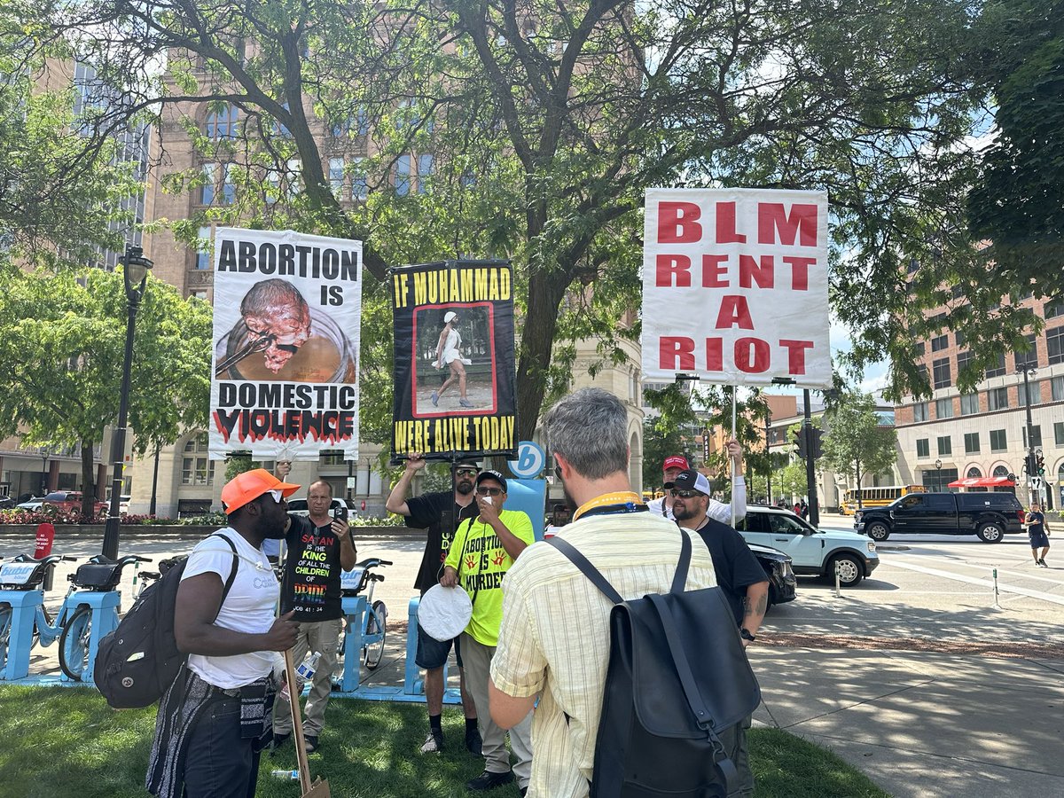 It’s the first day of the #RNCConvention — and all of the demonstrations that come with any political event. Here’s the scene moments ago at Red Arrow Park, where several groups are rallying before a march near the perimeter.