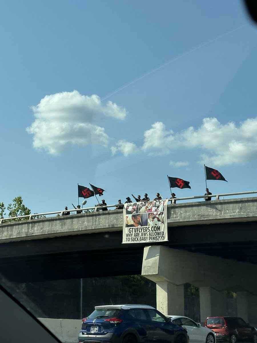 taradactyl33's tweet photo. CW! 
Upset to see Nazis on my way home. Can someone go up there and punch them off the overpass? 

(36.2646404, -86.7374119) https://t.co/mRKeOMzMZf