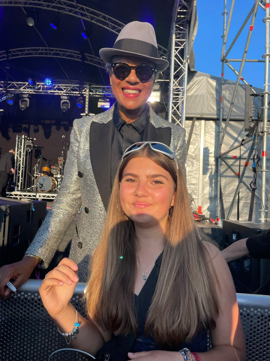 Goonerfluxy's tweet photo. @paulineblackOBE Was at jurassic fields, and you and the band were excellent as ever! Thanks for taking the time for a photo with my daughter she was made up to meet you. https://t.co/P1l1jo1mIl