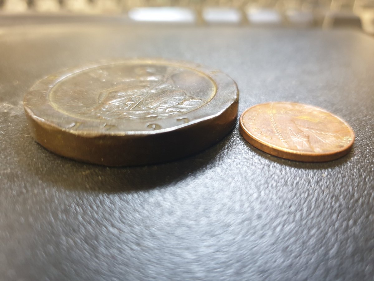 1797 "cartwheel" penny - never very popular because they were huge, heavy and generally very awkward. 

They're not rare, but this is the best condition example I've ever seen - usually, there's no readable text left and George III looks like a blob.