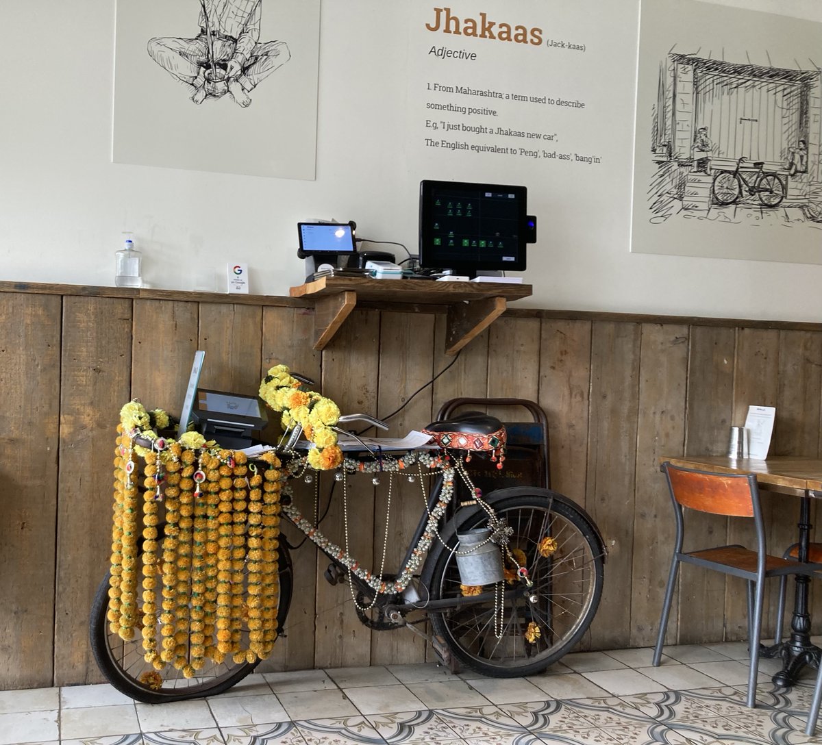 Just ate a meal at <a href="/BabujiUK/">Babuji</a> which left us blissfully happy and fully satisfied. Delightfully retro design, not over the top, Hindi film songs from the 50s and 60s and the best chai we've had in a very long time. Highly recommend the Bengali prawn curry and the masala dosa.