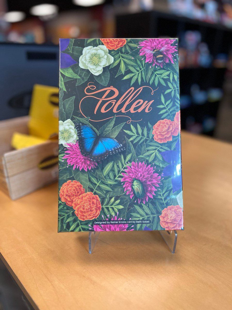 We've got a new board game on our shelves, and it's nothing to sneeze or sniffle at. Pollen is a game about building a beautiful garden to attract all sorts of pollinators from bees to butterflies. This abstract-style tile laying game is great for 2-4 players.