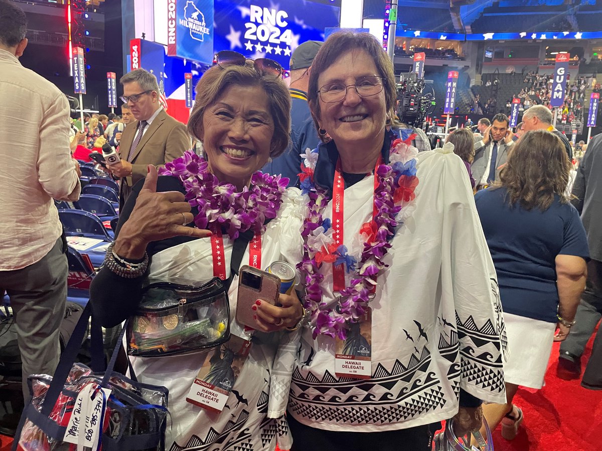 Hawaiian delegates wearing leis to show their state pride on the RNC floor on Day 1.