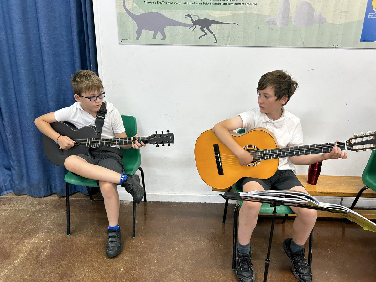 OaktreeThe's tweet photo. Such talent! Such an inspiration for our young children. Thank you to the five guitarists from The Hermitage Junior School who performed in our assembly today.  🎸 🎶 Jamin! https://t.co/kCTT1gtPEY