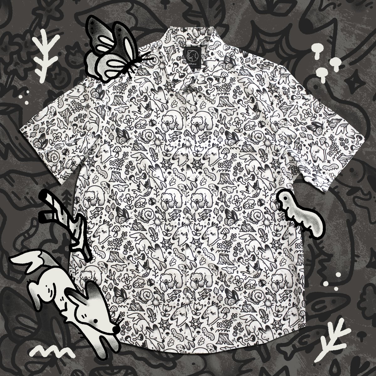 One of my new favourite button-up designs, inspired by tattoo flash and nature! The Tattoo Button Up will be available starting next week! ✏️
