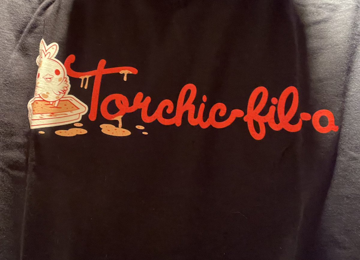 JoltyJon13's tweet photo. I caught a #shinyTorchic while in line at Chic Fil A. Naturally, I had to go home and put on this shirt.
Let it never be said this game doesn’t give us gifts 😂🐔 https://t.co/j8TjV7zVDt