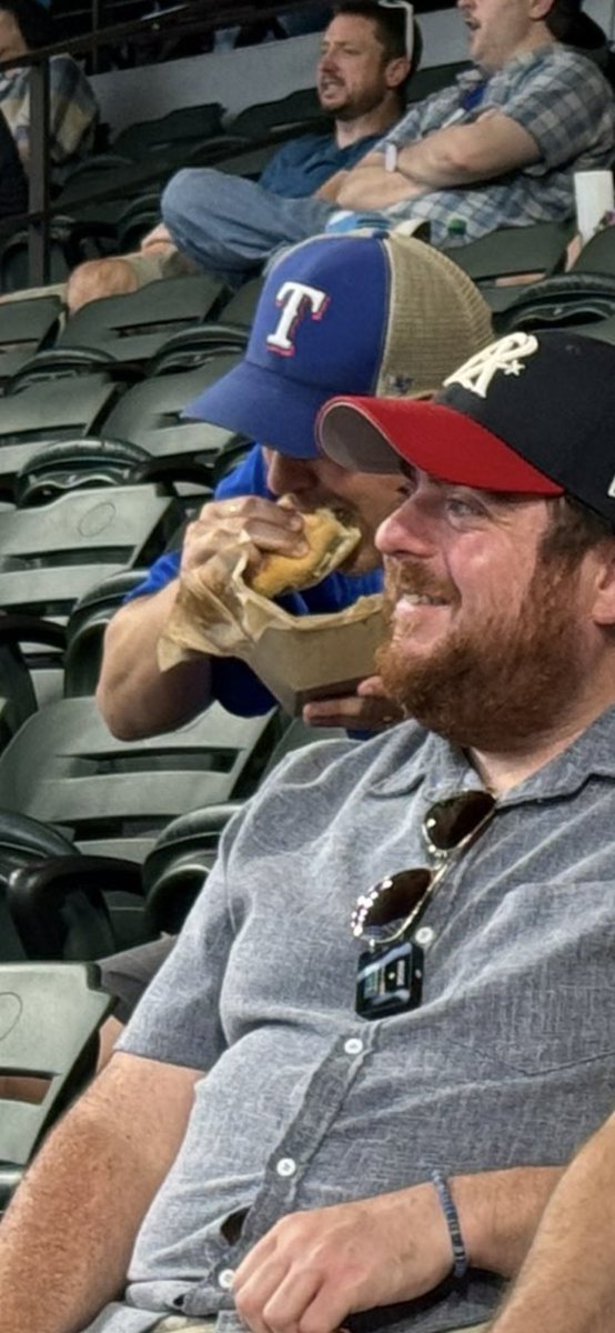 Rawfiuks's tweet photo. @tweetgrubes @theoldgreywolf @BeccaisaPenName @Riffraff3232 Is that @MikeSirois tearing up that hot dog behind you? 😂 https://t.co/3lzgqW0lNS