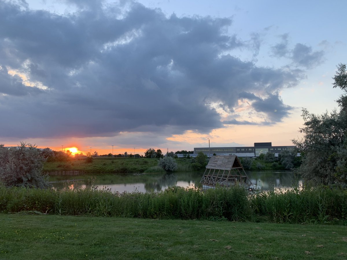 UWLowVision's tweet photo. Lovely evening sky on this warm evening on campus by the amphibious architecture research pavilion behind @UwOptometry #uwaterloo https://t.co/G8paGuGpu4