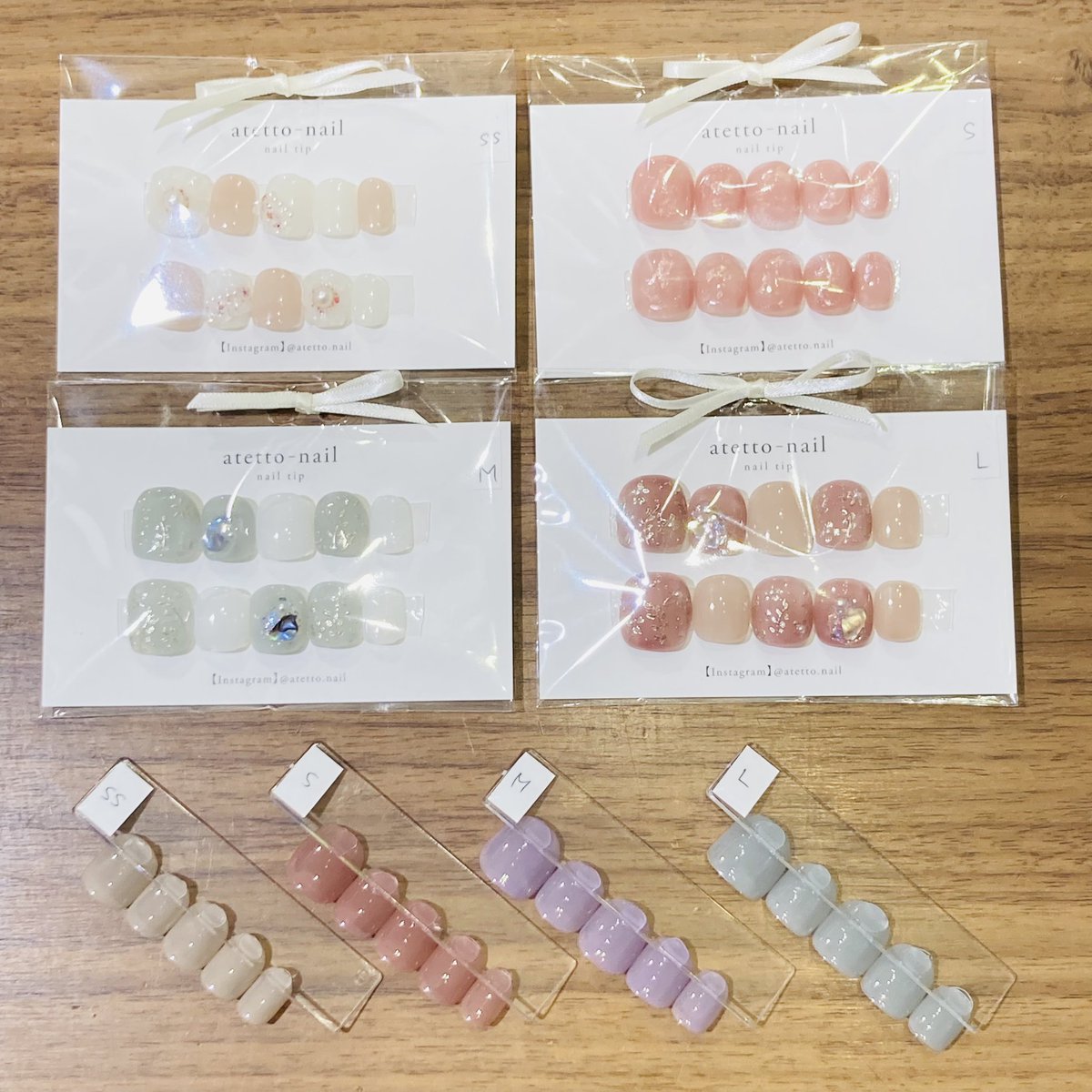 culier_sendai's tweet photo. さわやかな白がいちおしです！🤍
atetto-nailさんのネイルチップ入荷しました☺️短めタイプ（写真2枚目）もお届けいただいています！それぞれサイズ見本があるので合わせてみてくださいね🌼オーダーもぜひご相談ください💪
#クーリエ新作入荷
@AtettoNail https://t.co/BNJWdQTLCB