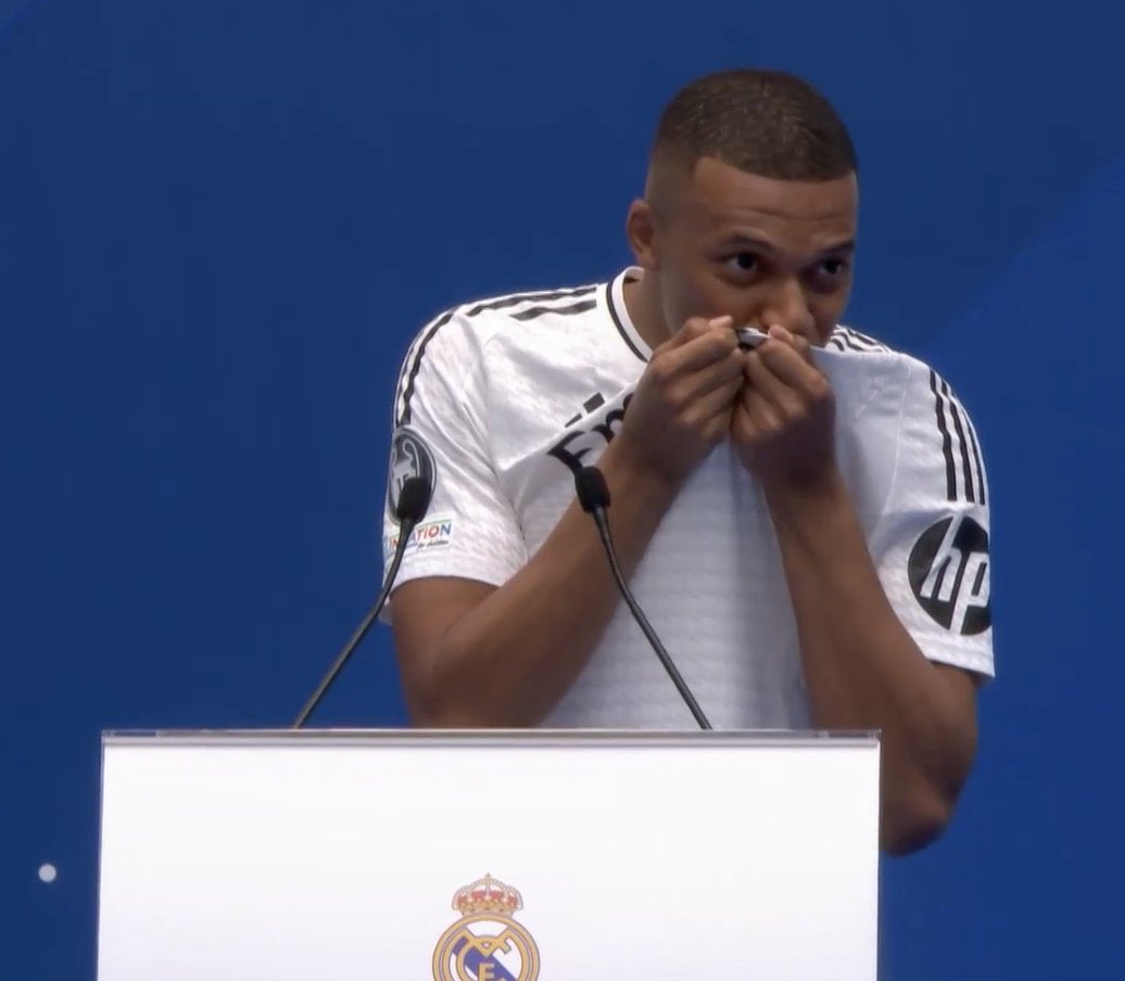Kylian Mbappé kisses Real Madrid badge. ✨