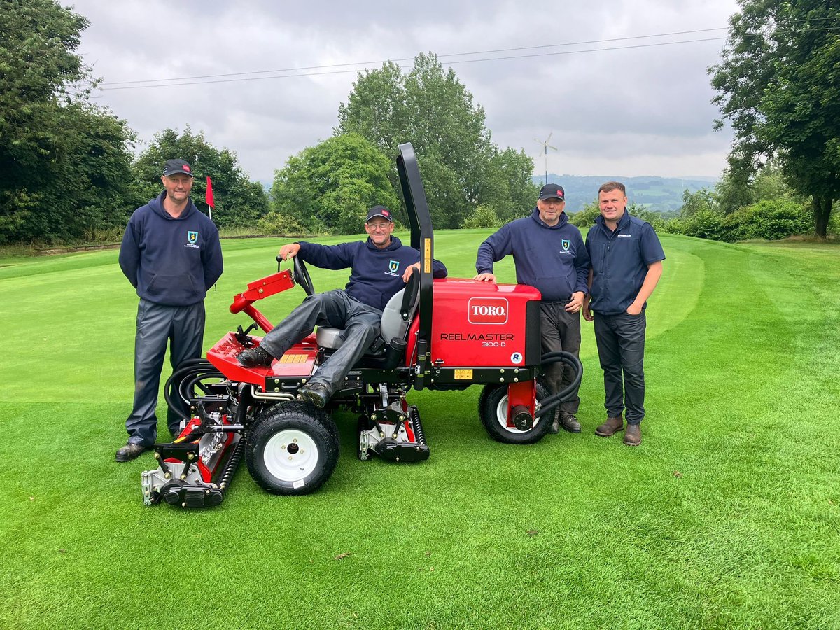 What a great photo of the new Toro Tees Mower with three of our green keeper s and the chap who delivered it this morning!