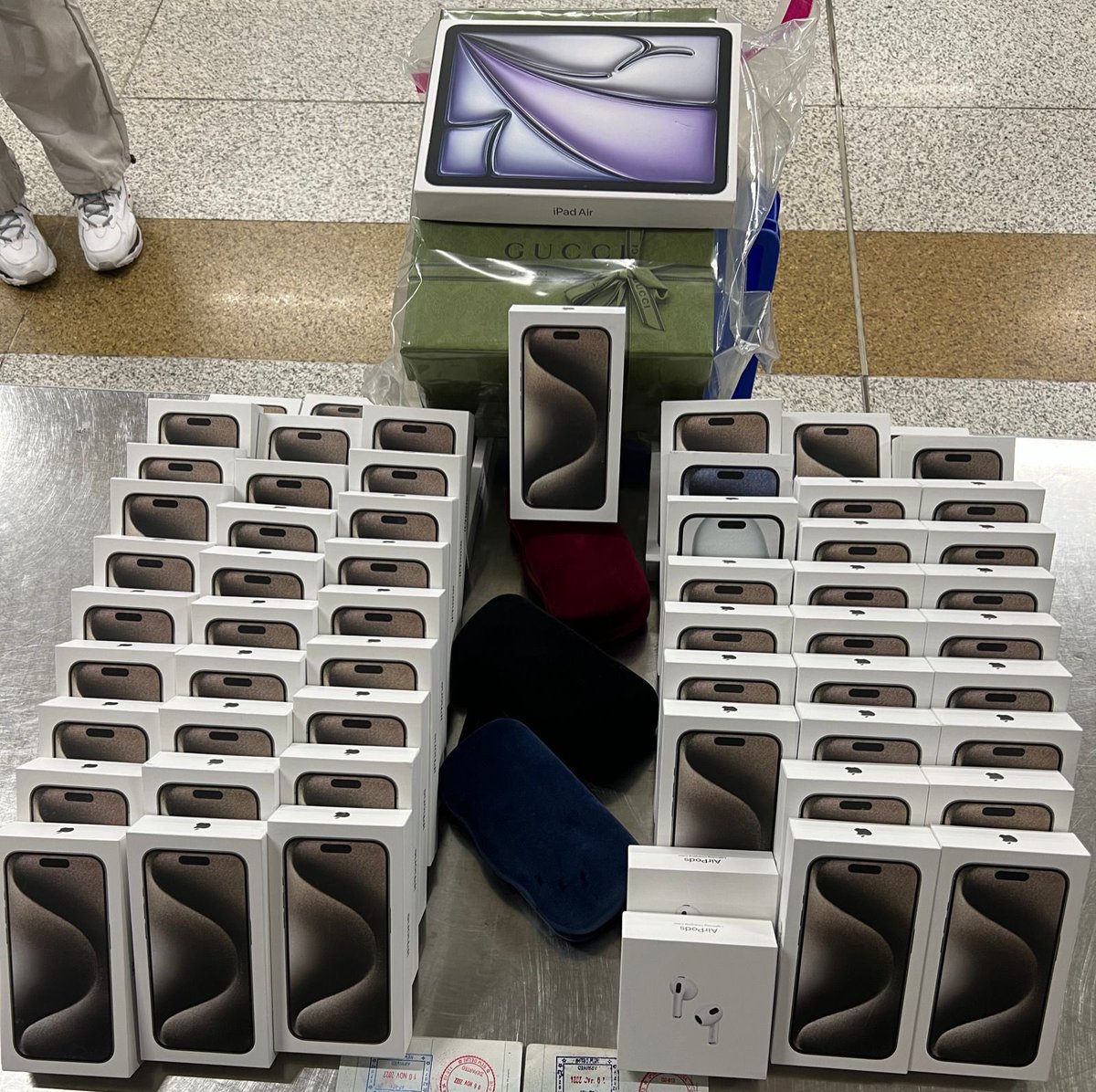 AirportGenCus's tweet photo. Based on profiling, Customs@IGI Airport have seized 59 iPhones along with other luxury goods collectively valued at Rs. 69.23 Lakhs from two Indian nationals who arrived from Milan. the passengers have been arrested under Customs Act 1962. Further investigation is underway. https://t.co/vGE6hv547S