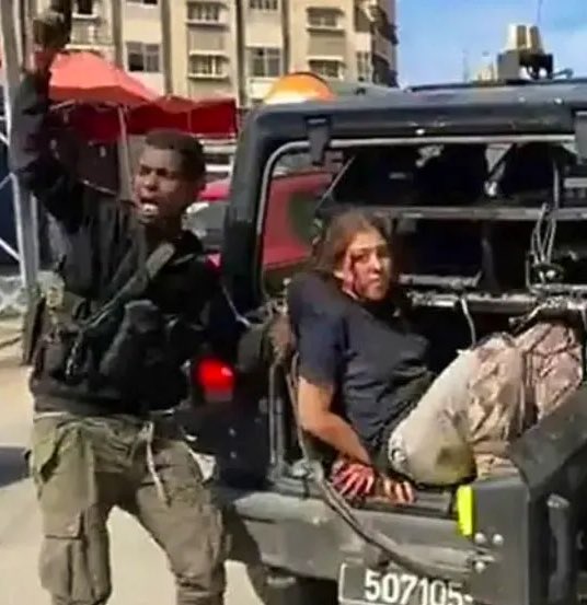 OliLondonTV's tweet photo. Dear Palestine Activists,

This is what the people you support did to a 19 year old. 

They beat her. 

They gave her a black eye. 

They cut her shins. 

They bound her hands.

They violated her, with her pants soaked in blood in her intimate areas.

This is what you support. https://t.co/5noxhIgtjG